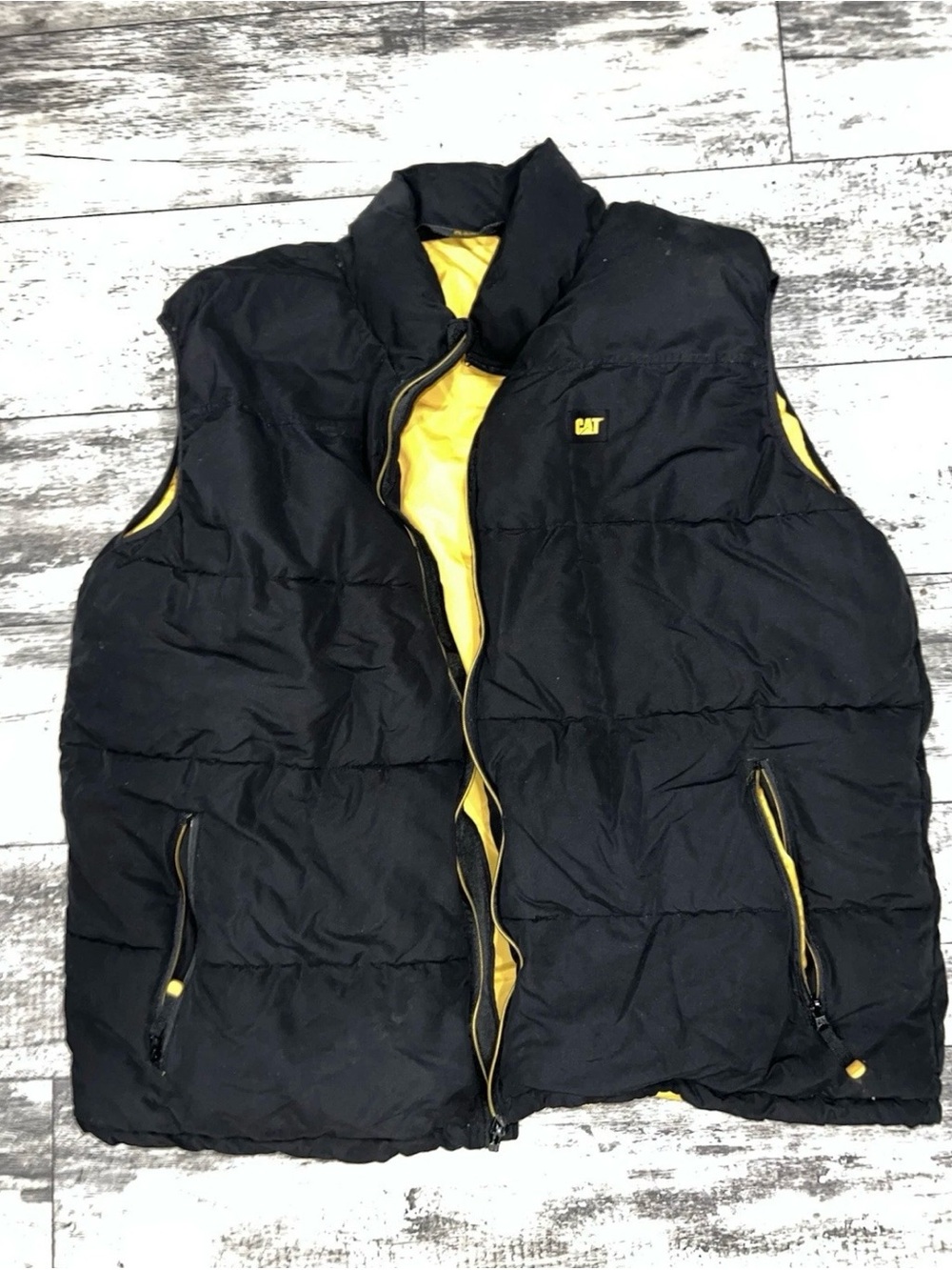 CAT Men's Black Puffer Vest with Yellow Lining